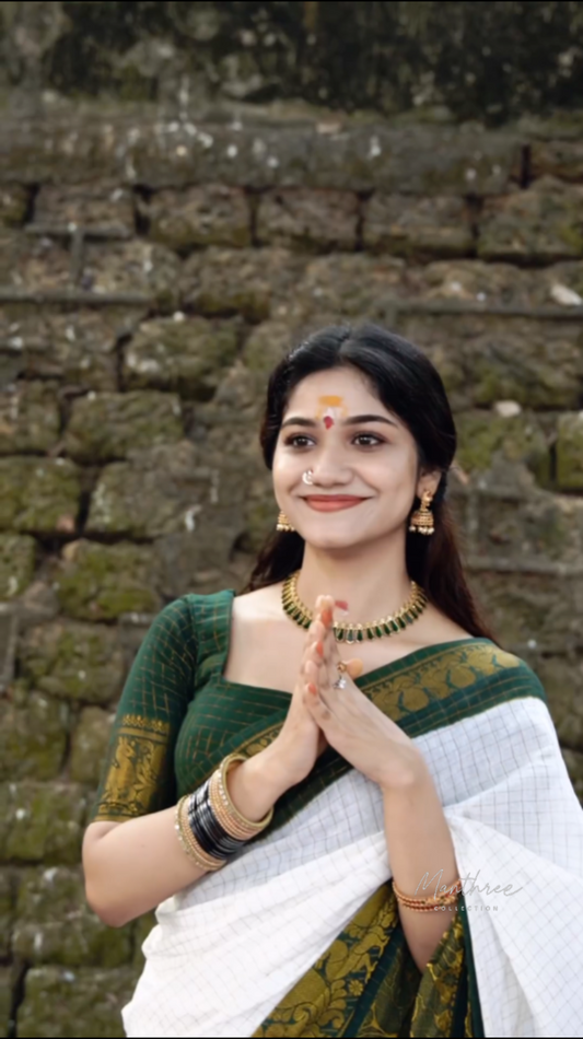 Green border onam saree